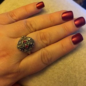 Silver ring with stones